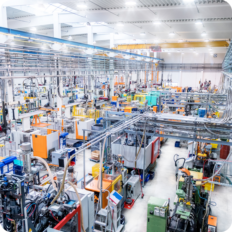Large industrial factory with various machines and equipment.